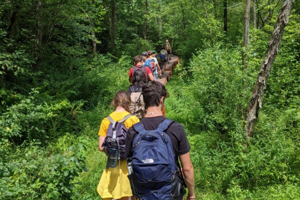 Investigator campers taking a hike