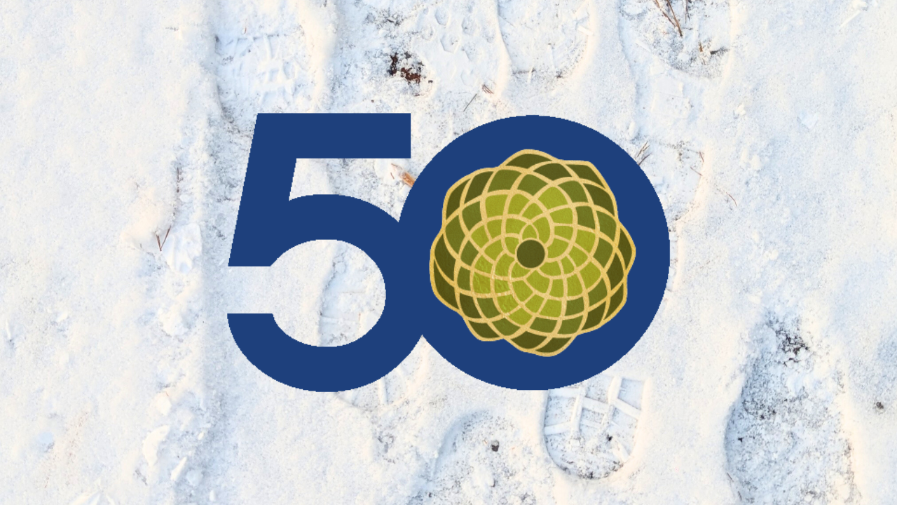 A big 50 overtop of a photo of footprints in the snow