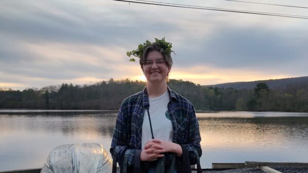 Riley standing in front of Lake Perez