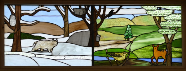 Stained glass window of outdoor landscape