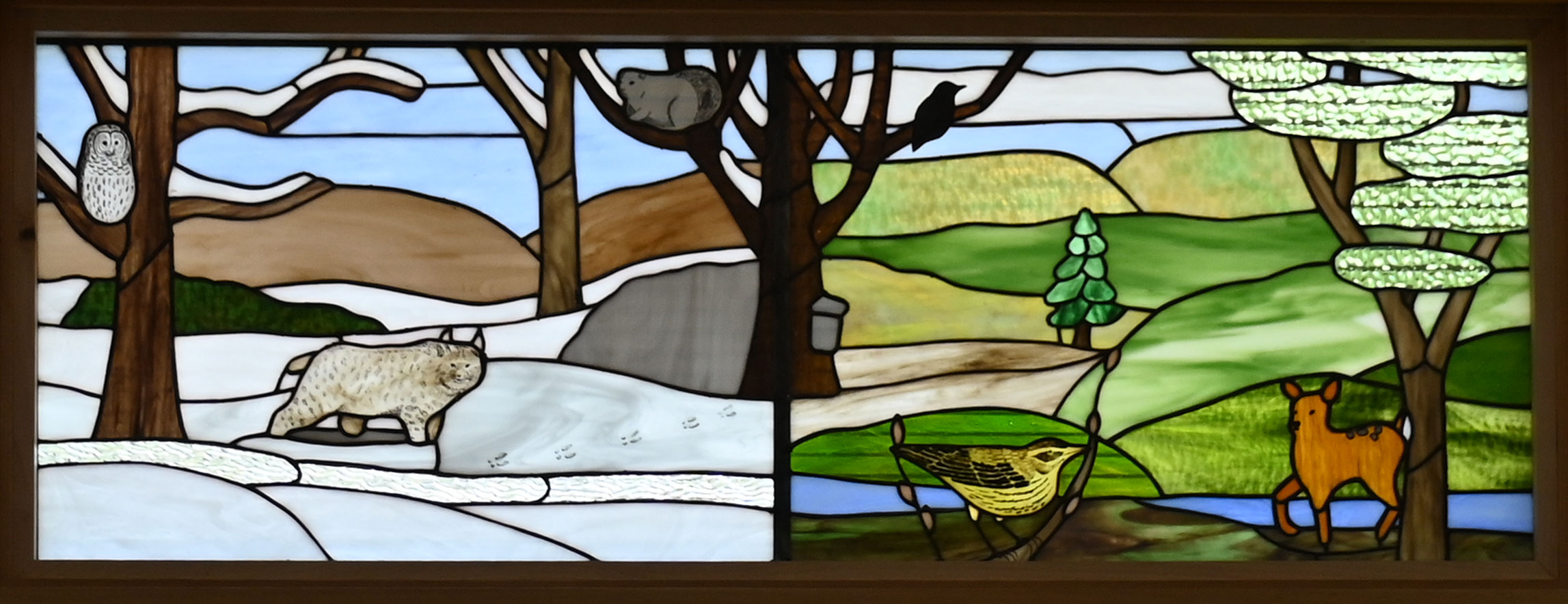 Stained glass window of outdoor landscape