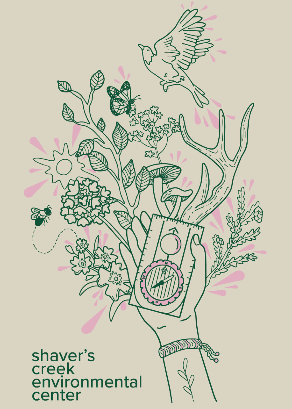 A t-shirt design in dark green and pink ink that shows a drawing of a hand holding a compass with drawn nature scenery in the background.