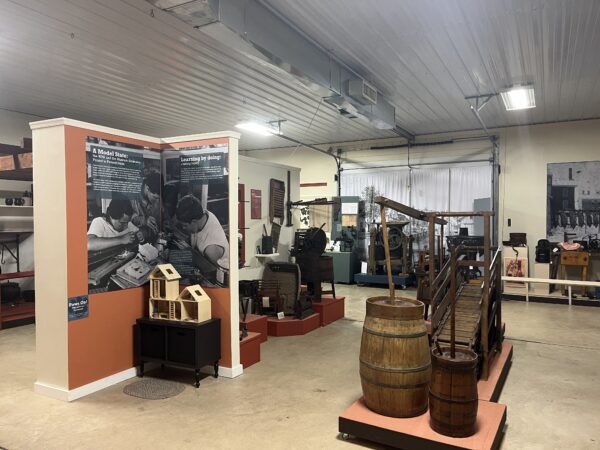 Antique agriculture equipment in a museum setting