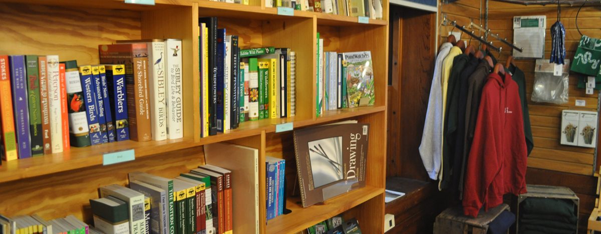Books and shirts for sale at the Shaver's Creek bookstore