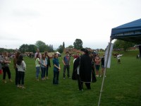 People watching a falcon at the Renaissance fair