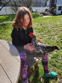 Grace with family chicken