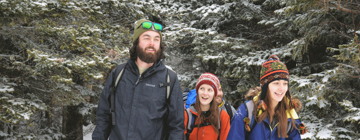 SEED Students Walking in a Snowy Forest