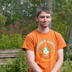 Ryan standing at frog pond