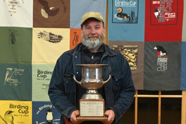 Jon Kauffman holding the Birding Cup