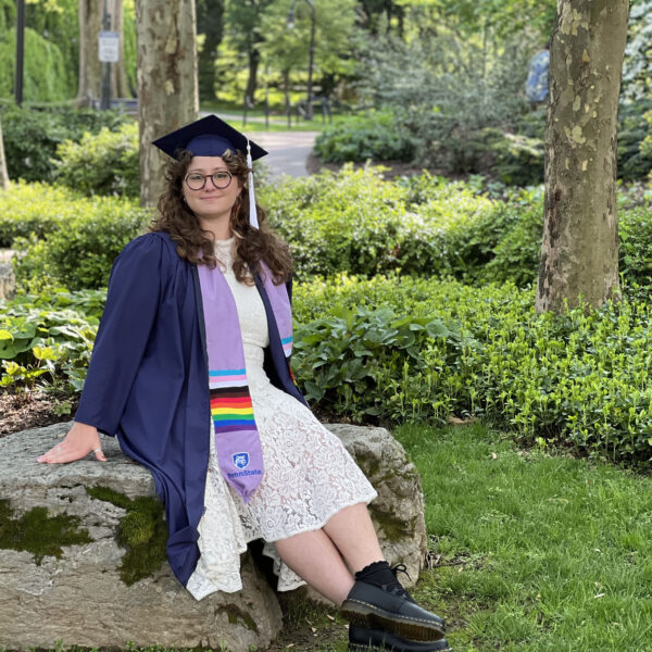 Fi Montanay posing in cap and gown