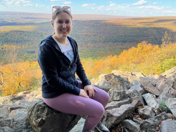 Kate Rawson poses at an overlook near Greenwood Furnace State Park