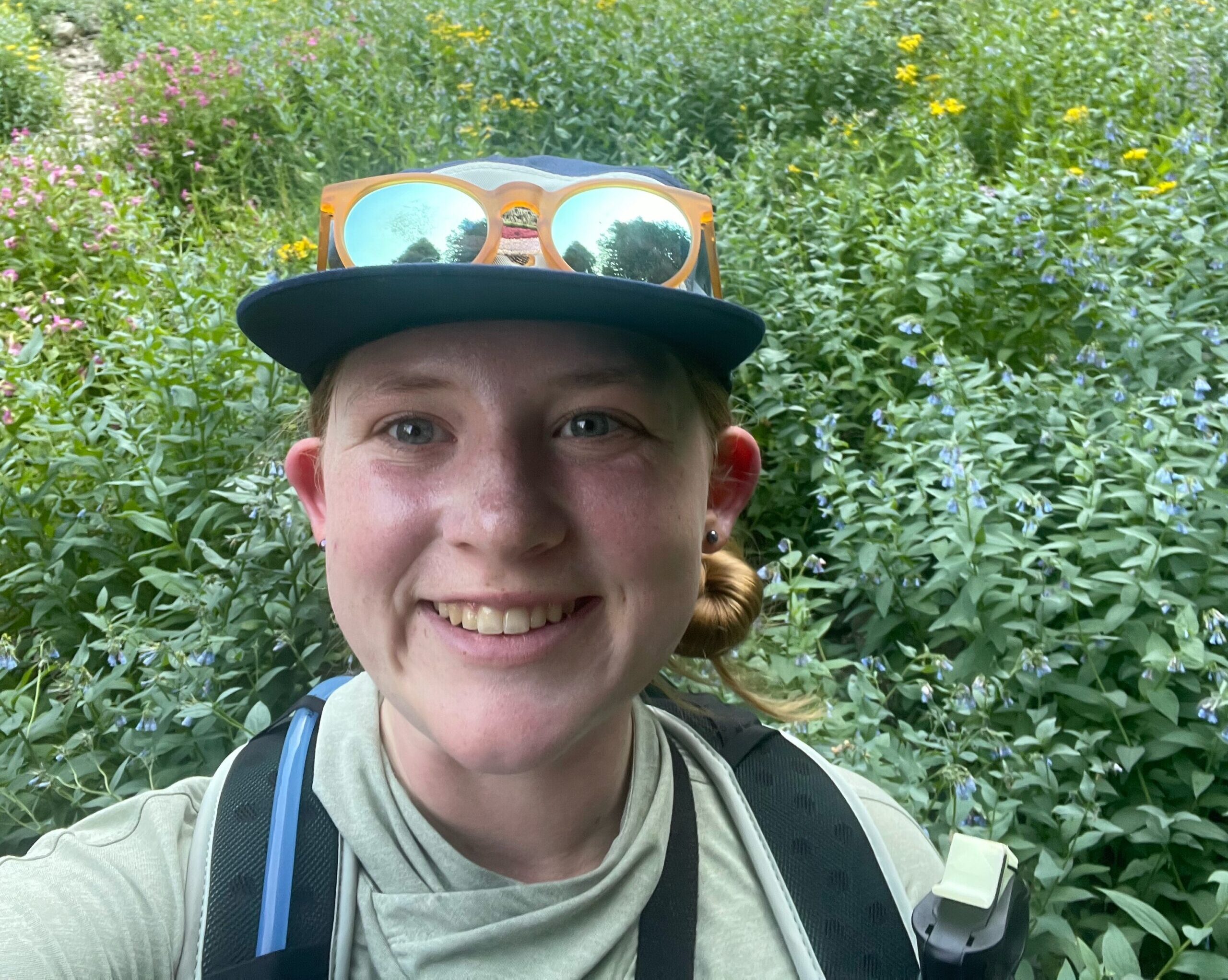 Bianca Wilder standing in a green meadow.