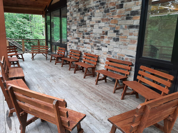 Hamer Deck set up with wooden benches in a circle.