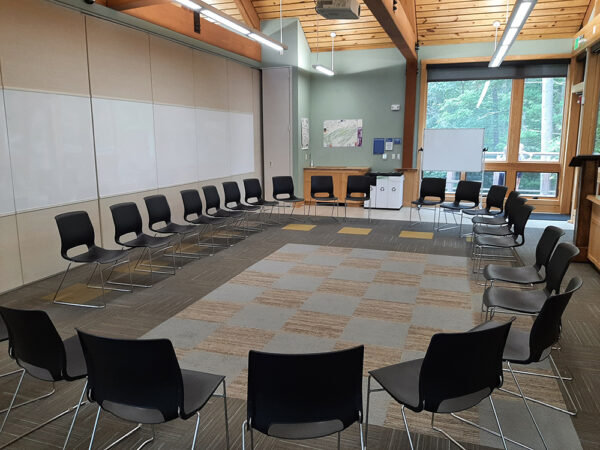 Hamer Lakeside Classroom set up with a circle of chairs and no tables.