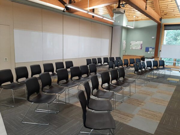 Hamer Lakeside Classroom set up with chairs in rows facing the front of the classroom and no tables.